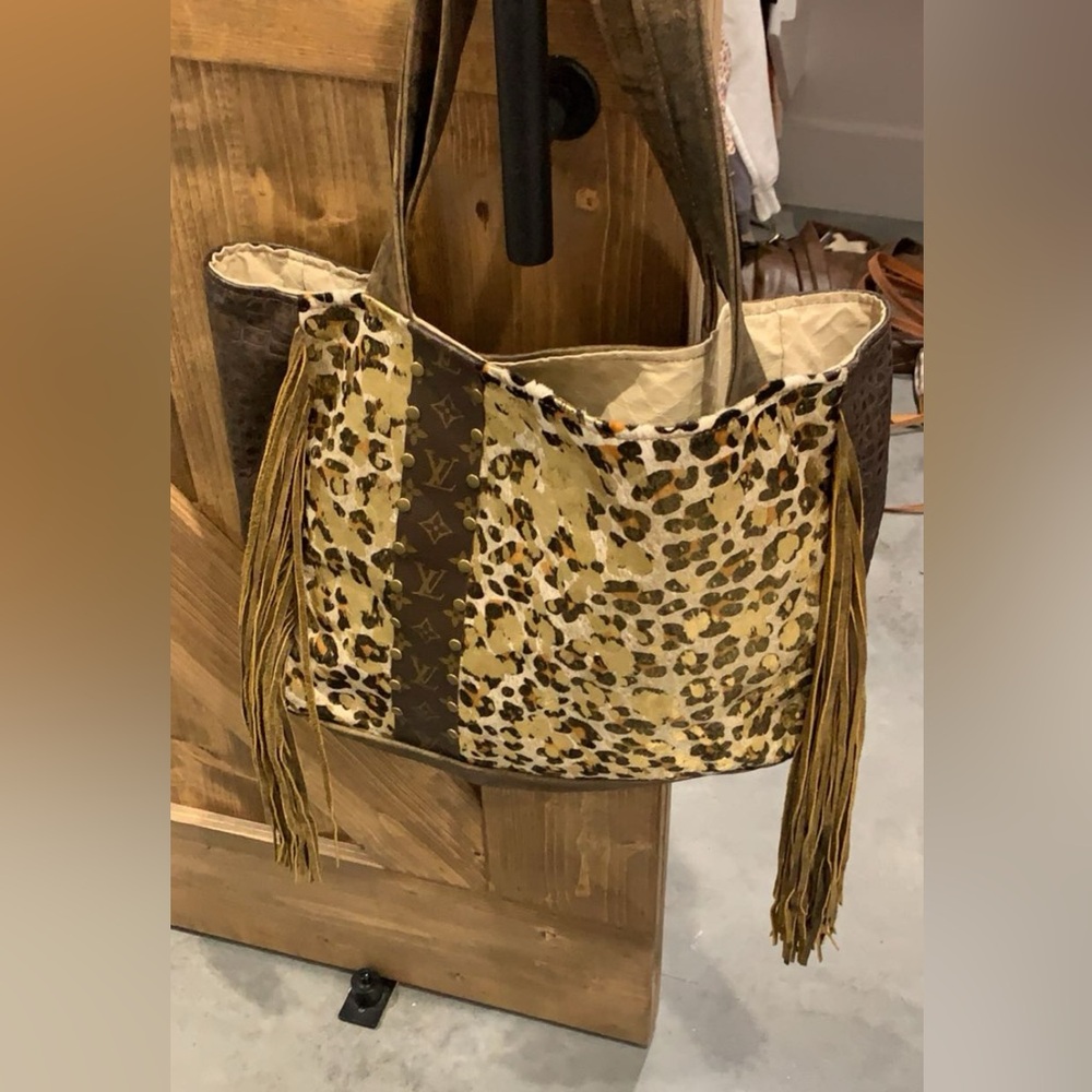 Super cute western vibe with leather fringe- genuine Large LV Upcycle tote bag.